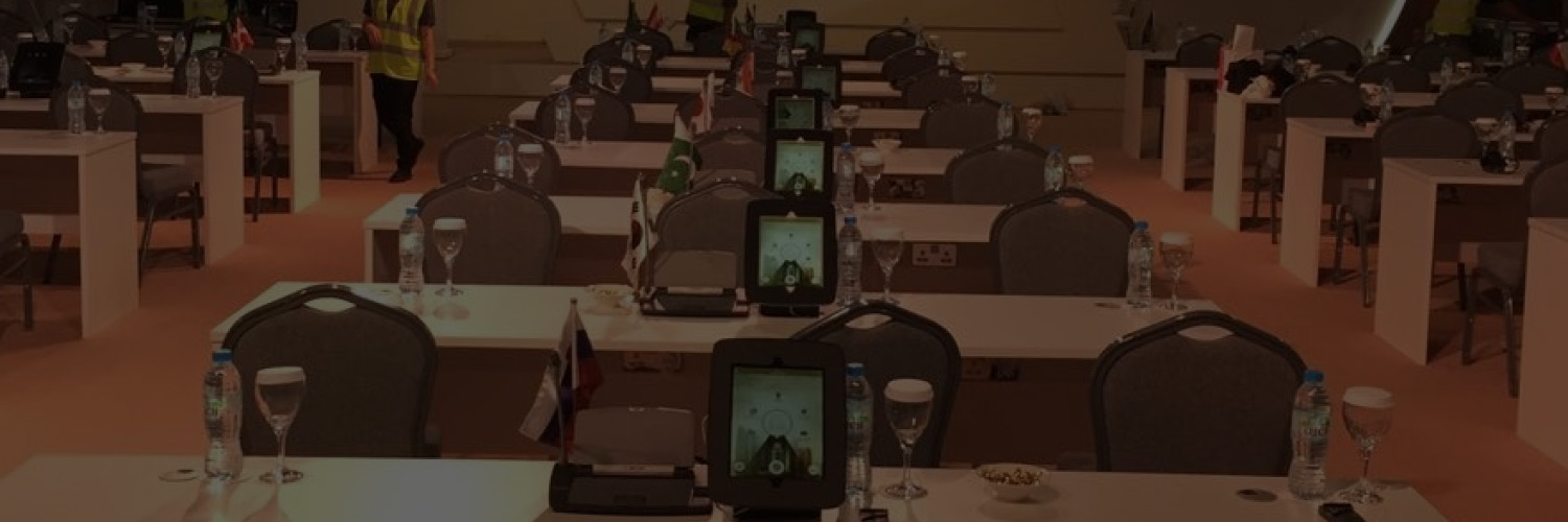 Conference room setup with iPads ready for a meeting or training session